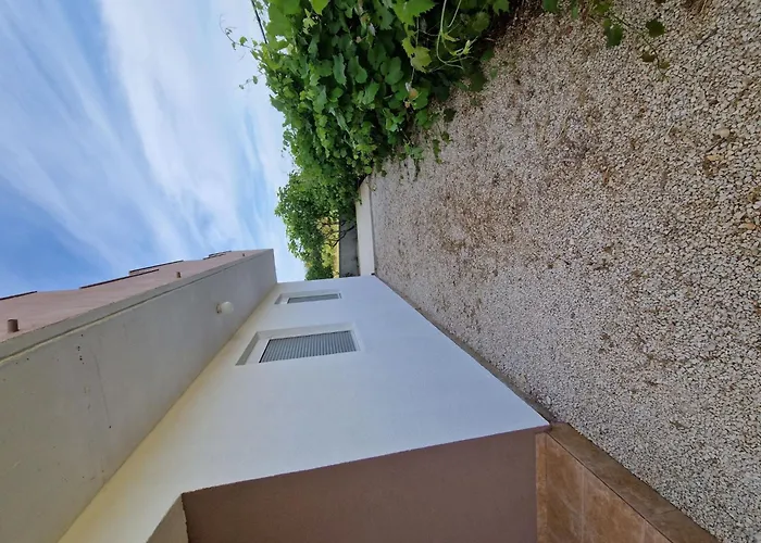 Gemuetliche Erdgeschosswohnung Ema Mit Terrasse By Interhome * Vir